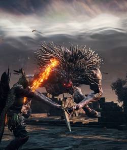 Ironeye aims a flaming shot at a giant troll in a screenshot from Elden Ring Nightreign