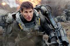Tom Cruise wearing a mech suit in Edge of Tomorrow